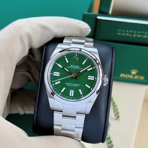 3A937A78-C9CC-44CB-A428-841DDDC70090.jpg ROLEX OYSTER PERPETUAL GREEN