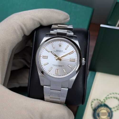 4D910584-E97F-4EEF-B225-6229841A766D.jpg ROLEX OYSTER PERPETUAL SILVER DIAL