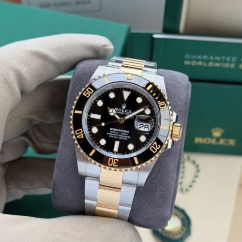 53C59A02-7CAE-4F90-8200-4266A1E199EA.jpg ROLEX SUBMARINER GOLD & BLACK