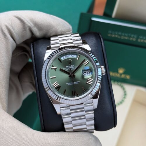 92C1541A-3F73-4C5C-9089-17011C4421B0.jpg ROLEX DAY-DATE GREEN DIAL