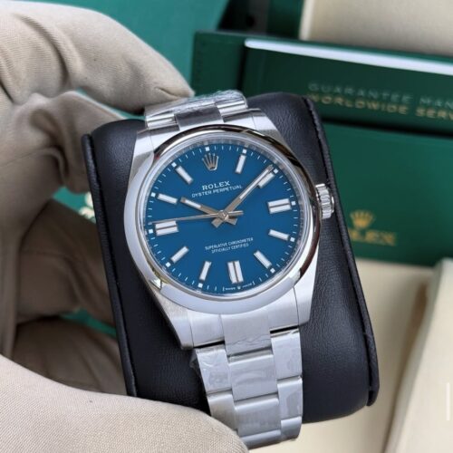 C0E3BD03-517B-4A72-8152-E1577ECE2D42.jpg ROLEX OYSTER PERPETUAL BLUE DIAL