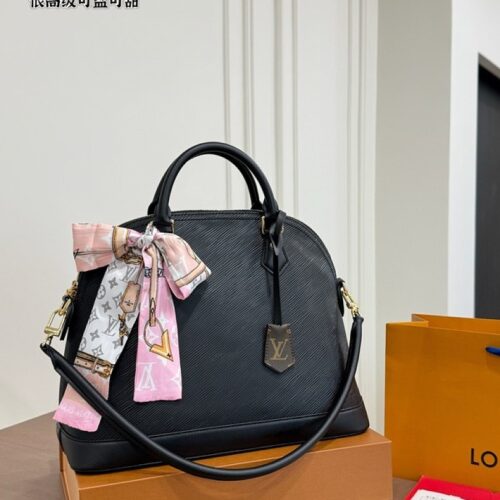 06f22756a6 Louis Vuitton Textured Dome Bag — Black & Tan Options