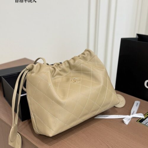 Chanel Quilted Drawstring Shoulder Bag — Beige