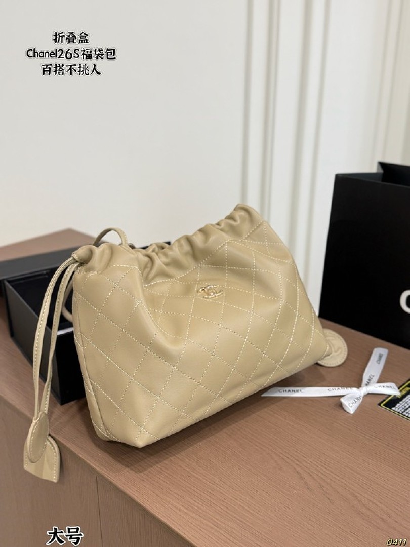 Chanel Quilted Drawstring Shoulder Bag — Beige