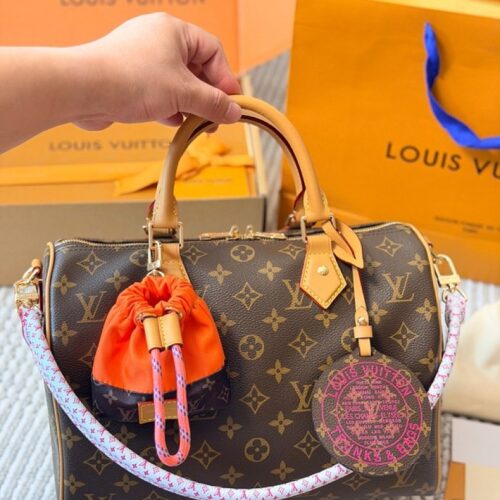5a2177aecf Louis Vuitton Speedy-Style Monogram Bag with Orange Pouch — Brown & Pink