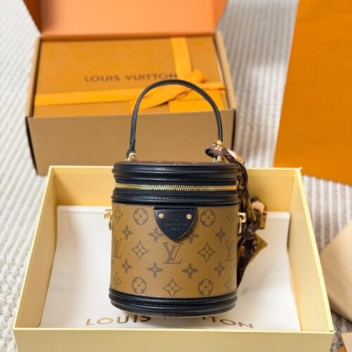 838343d24e Louis Vuitton Cannes-Style Monogram Cylinder Bag — Tan & Black